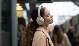 Women wearing the noise reduction headphones