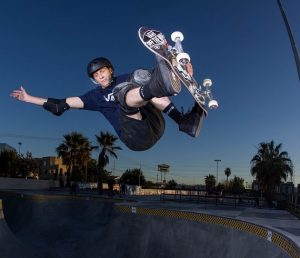 tony hawk skating at a skate park