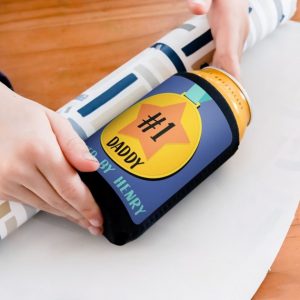 stubby holder on a beer getting wrapped