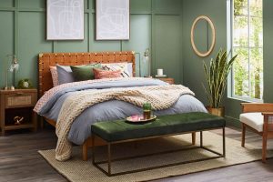 a bedroom decorated in darker colors