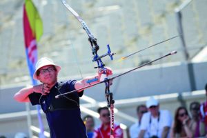 man in the bow international competition with Target Recurve Bow