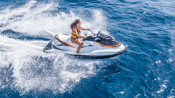 girl on a jet ski with safety vest